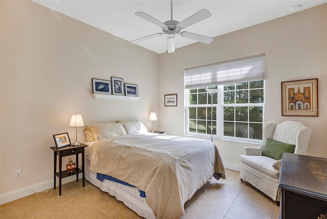 bedroom featuring light tile patterned floors and ceiling fan