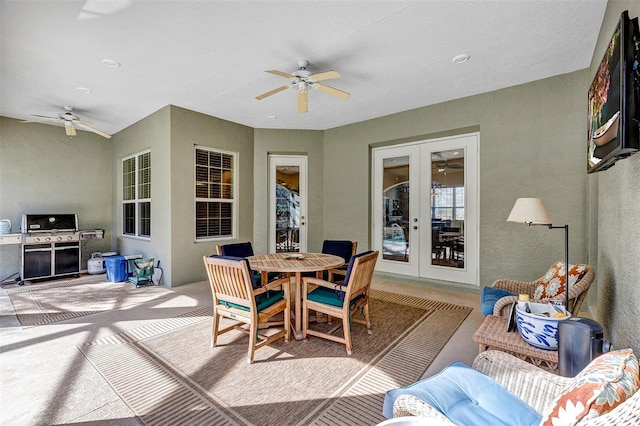 view of patio / terrace featuring french doors, ceiling fan, and a grill