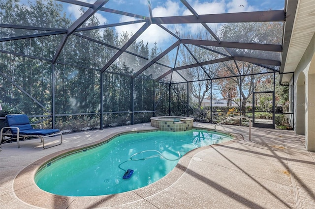 view of swimming pool featuring an in ground hot tub, a patio, and glass enclosure