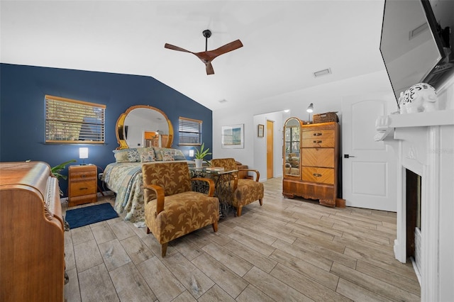 bedroom with ceiling fan and vaulted ceiling