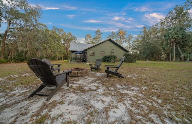 view of patio / terrace with a fire pit