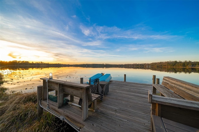view of dock with a water view