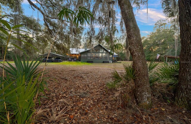 view of yard with a carport