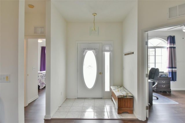 foyer with light wood-type flooring