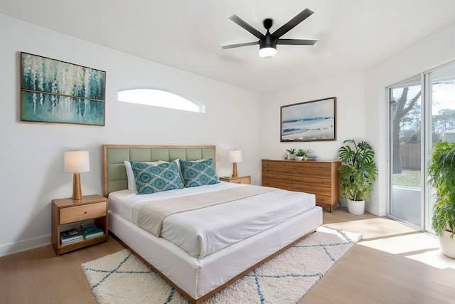 bedroom with light wood-style flooring, baseboards, access to exterior, and a ceiling fan