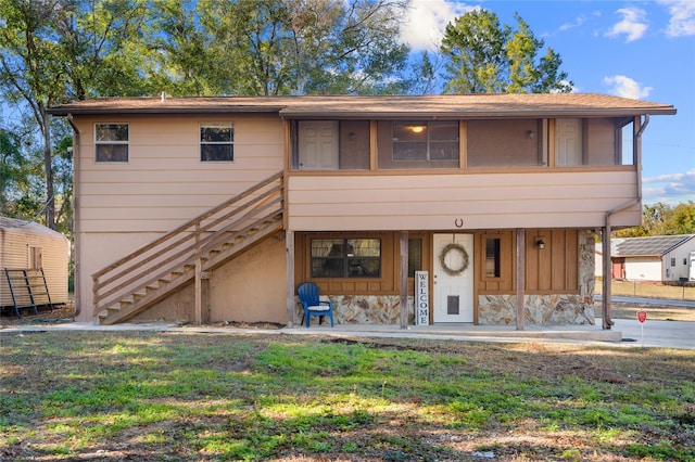 view of front of house with a patio