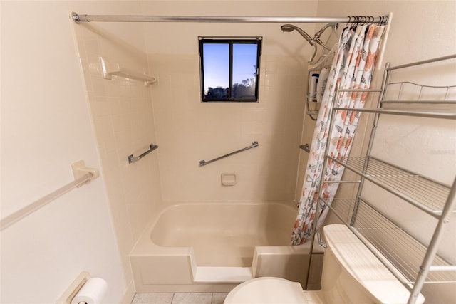 bathroom featuring shower / bath combo and toilet