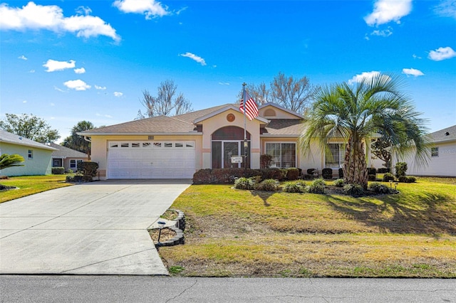 ranch-style house featuring a garage and a front lawn