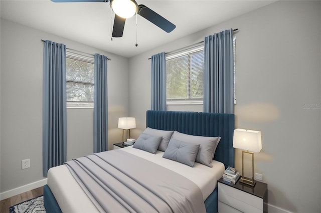 bedroom featuring ceiling fan and hardwood / wood-style floors