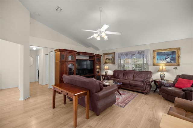 living area featuring visible vents, high vaulted ceiling, light wood-style flooring, baseboards, and ceiling fan