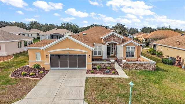 view of front facade featuring stucco siding, a front lawn, concrete driveway, an attached garage, and central AC unit