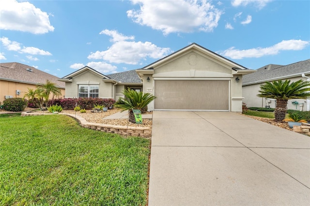 single story home featuring an attached garage, a front lawn, concrete driveway, and stucco siding