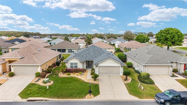 drone / aerial view featuring a residential view