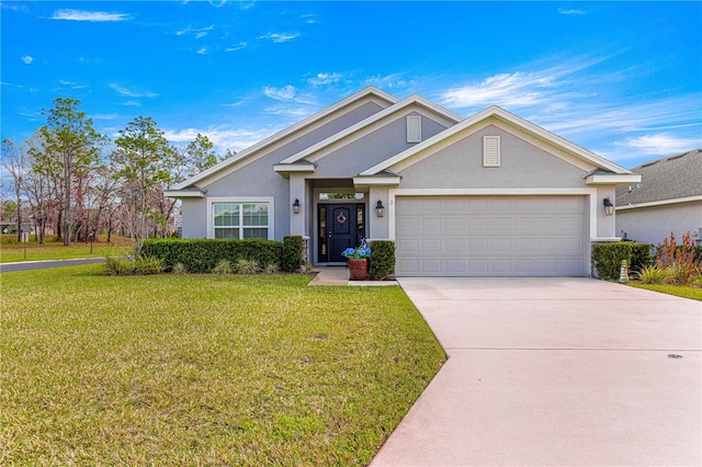 view of front of property featuring a garage and a front yard