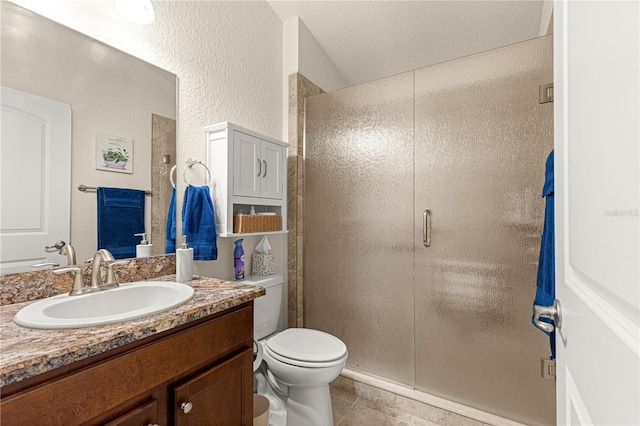 bathroom featuring vanity, an enclosed shower, tile patterned floors, and toilet