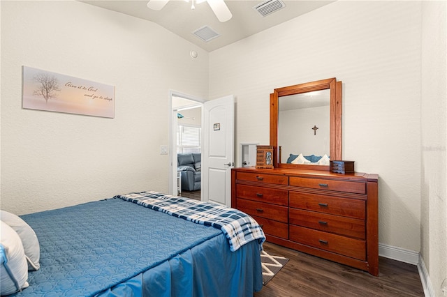 bedroom featuring ceiling fan, lofted ceiling, and dark hardwood / wood-style floors