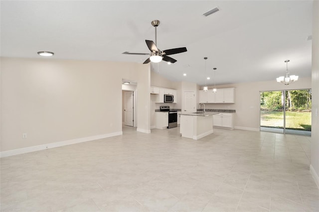 unfurnished living room featuring ceiling fan with notable chandelier, high vaulted ceiling, and sink