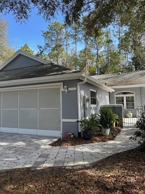 exterior space with a garage