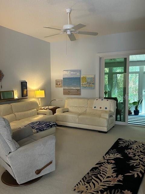 living room featuring ceiling fan