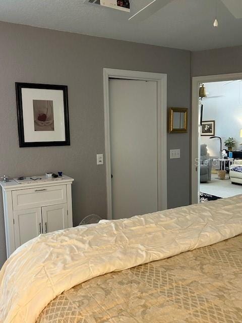 bedroom featuring ceiling fan