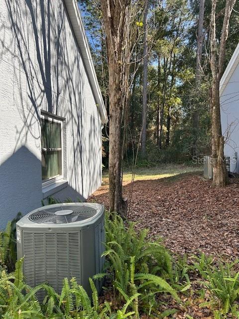 view of yard featuring central AC unit