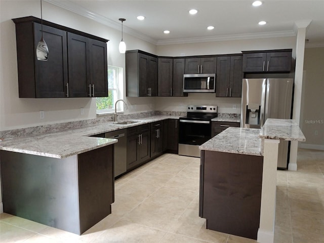 kitchen with pendant lighting, sink, light stone counters, stainless steel appliances, and dark brown cabinets