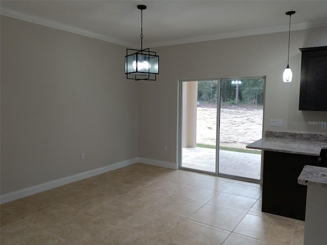 unfurnished dining area with crown molding and light tile patterned floors