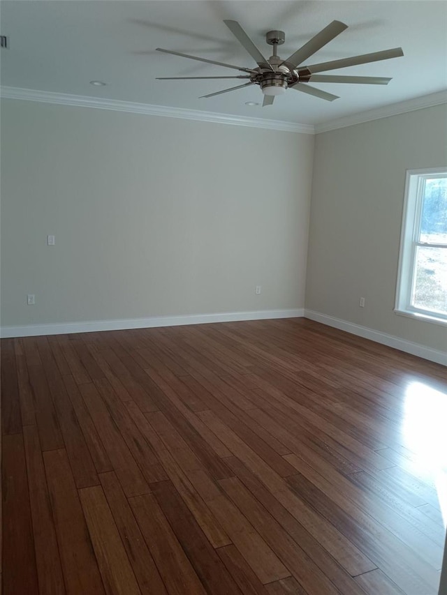 unfurnished room with hardwood / wood-style flooring and crown molding