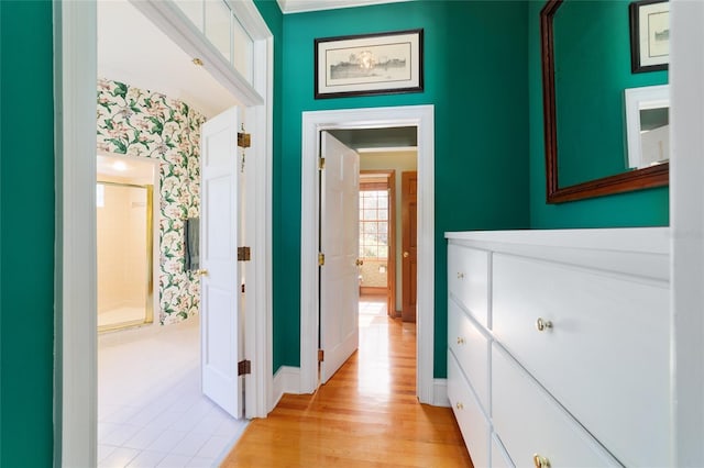 corridor with light wood-type flooring