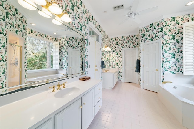 bathroom featuring vanity, independent shower and bath, and ceiling fan