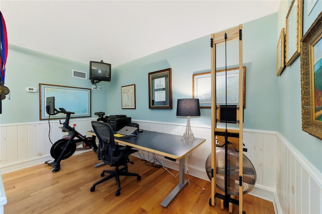 office space with light wood-type flooring