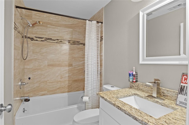 full bathroom with shower / bath combination with curtain, vanity, and toilet