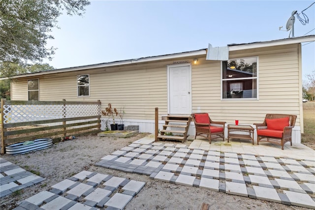 back of property featuring a patio