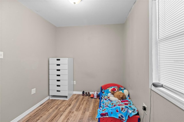 recreation room featuring light wood-type flooring