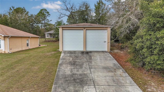 garage with a lawn