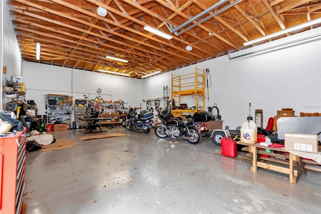 garage with a workshop area