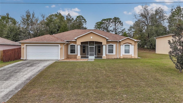 ranch-style house with a garage and a front lawn