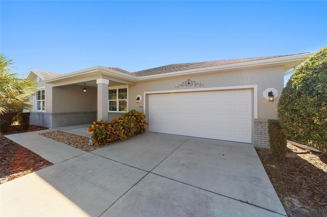 view of front of home with a garage