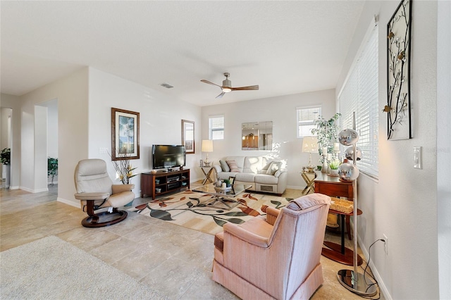 living room with ceiling fan