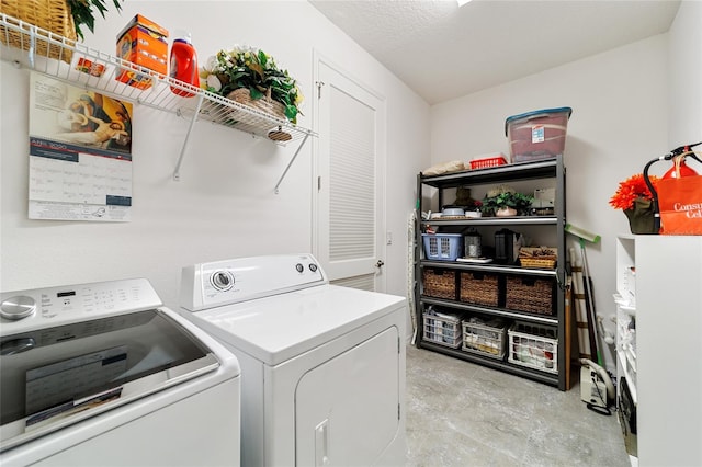 laundry area with separate washer and dryer