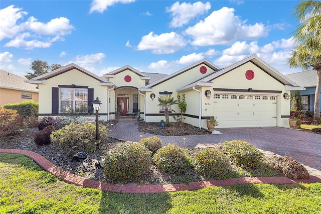 ranch-style home with a garage