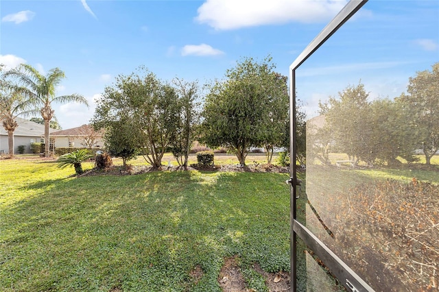 view of yard with a rural view