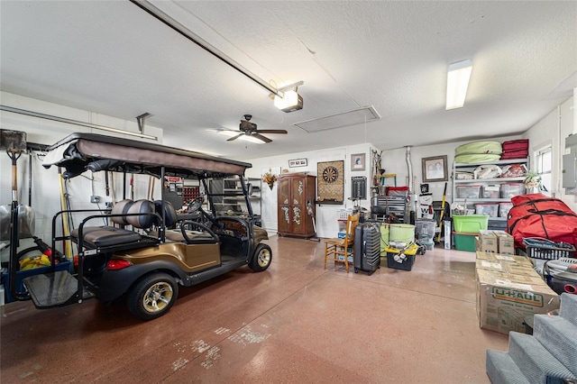 garage with a garage door opener and electric panel