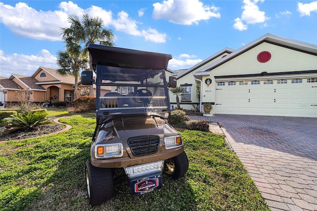 view of front of property with a garage