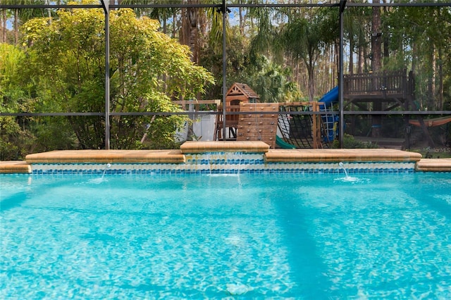 view of pool featuring pool water feature