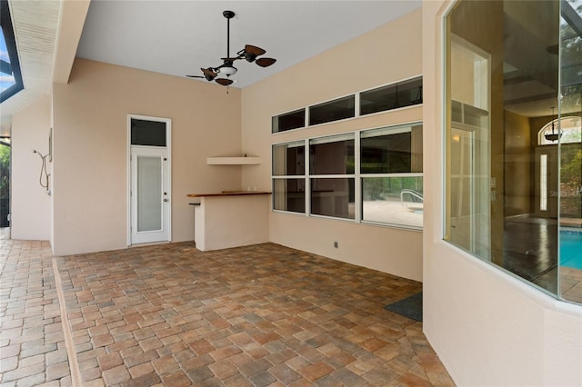 view of patio with ceiling fan