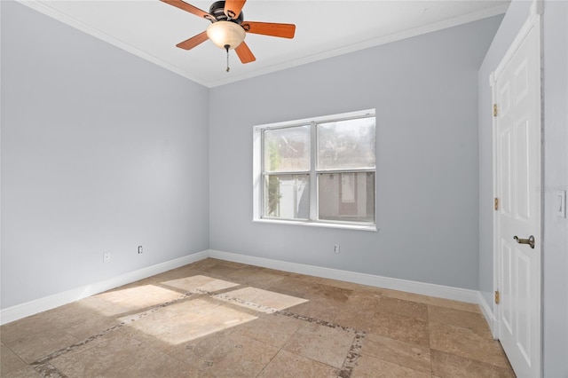 spare room with ceiling fan and ornamental molding