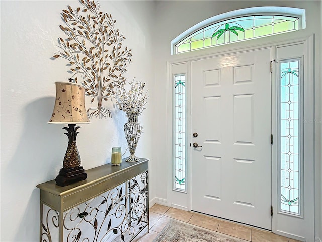 entrance foyer featuring light tile patterned flooring