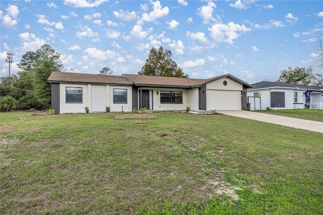 ranch-style home featuring a garage and a front yard