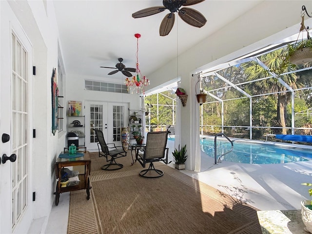 view of pool featuring french doors, a patio, and glass enclosure